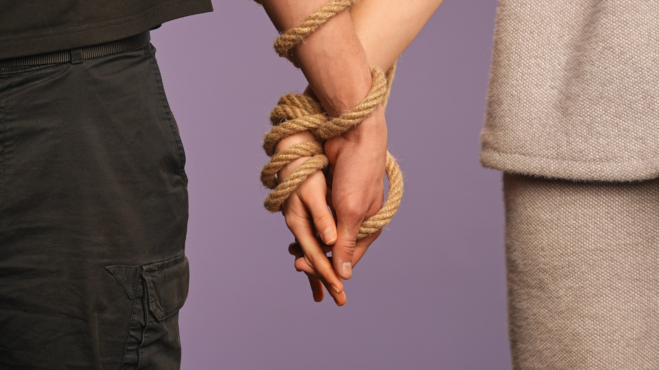 Boundaries and Codependency in Relationships 1 Symbolic representation of codependent relationship patterns with entwined hands or bonded couple